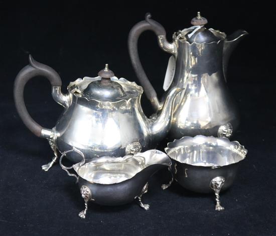 An Edwardian silver four piece tea set by John Hunt, London, 1905/6, gross 33 oz.